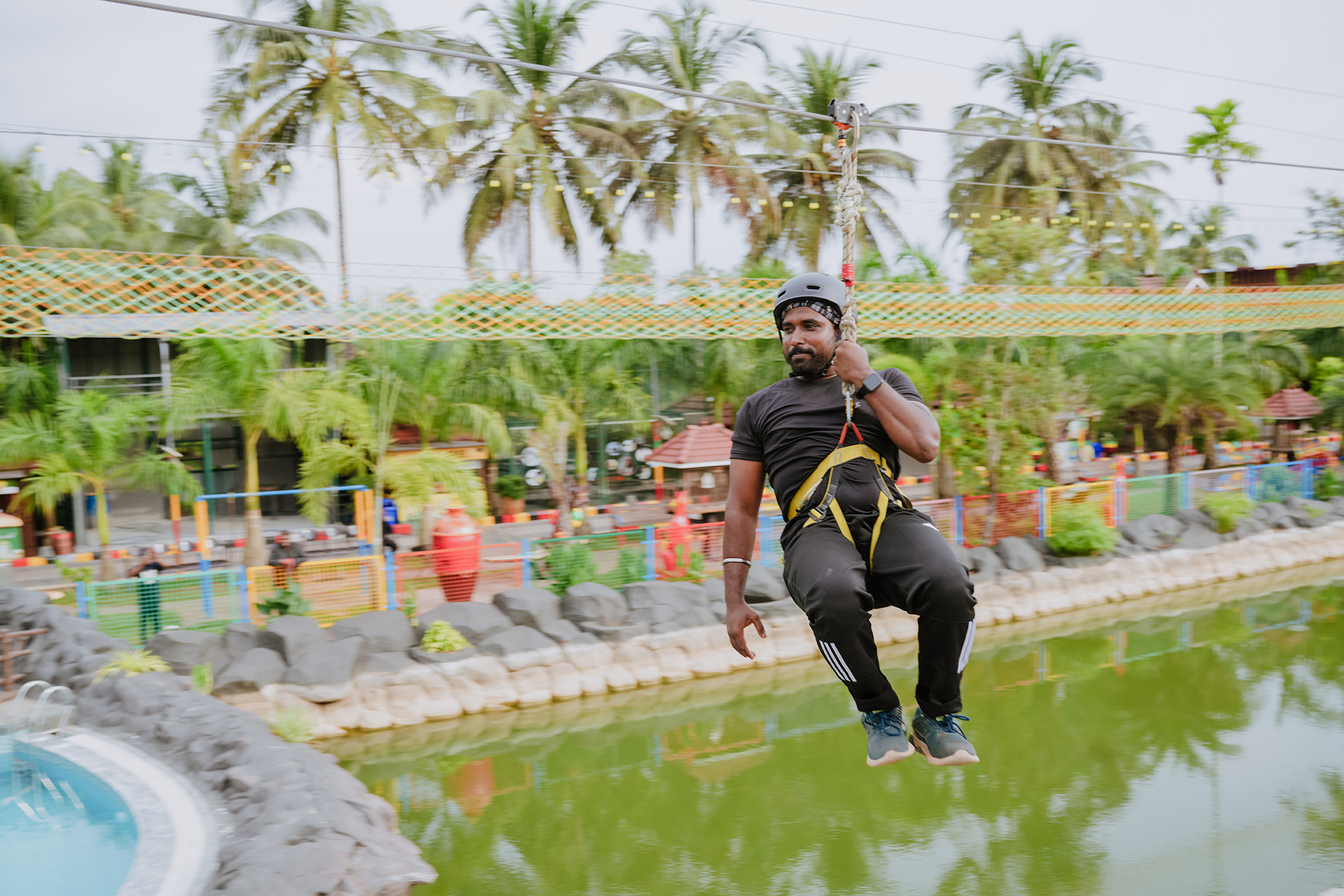 Visitor enjoying a zip line adventure at Arco Park ’N’ Resort, Kasaragod